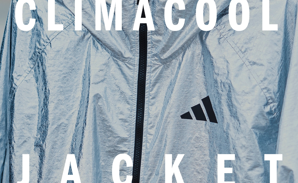 Close-up view of a silver adidas jacket with logo, with the text “Climacool Jacket.” (Photo)